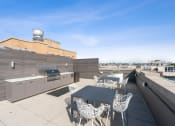 Thumbnail 5 of 8 - Newly renovated rooftop with grill at The DeSoto Apartments in Washington, DC 20005