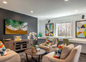 Thumbnail 5 of 11 - a living room filled with furniture and a large window