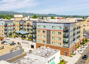 Thumbnail 19 of 20 - an aerial view of an apartment building in a city