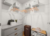 Thumbnail 7 of 27 - a walk in closet with white walls and a rack with shoes and a hat