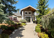 Thumbnail 3 of 11 - a home with a pathway leading up to the front door
