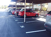 Thumbnail 19 of 22 - a red car parked on the side of a boat at Cowell Terrace Apartments, California