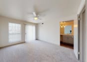 Thumbnail 2 of 60 - an empty living room with a ceiling fan and a window
