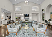 Thumbnail 9 of 27 - A living room with a grey sofa and a coffee table.