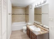 Thumbnail 15 of 22 - a bathroom with a sink and a toilet