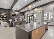 Thumbnail 6 of 19 - A modern reception area with a dark grey reception desk and a large flat screen TV mounted on the wall.