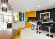 Thumbnail 18 of 18 - a kitchen and dining room with a table and chairs