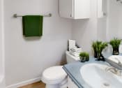 Thumbnail 10 of 18 - a small bathroom with a sink and toilet