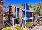 Thumbnail 16 of 16 - a blue house with a blue chimney on top of it