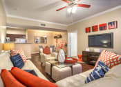 Thumbnail 25 of 25 - a living room with couches and a tv