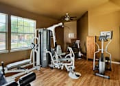 Thumbnail 8 of 38 - Well Equipped Gym at Country Oaks Apartments, San Marcos, Texas