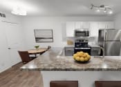 Thumbnail 9 of 23 - a kitchen with stainless steel appliances and a granite counter top