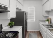 Thumbnail 6 of 18 - a kitchen with white cabinets and a black refrigerator