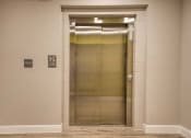 Thumbnail 14 of 27 - an elevator in a building with its door open