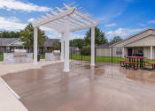 Thumbnail 12 of 13 - Outdoor patio and grills at Carolina Pines Apartments, Conway