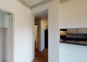 Thumbnail 10 of 43 - a view of the kitchen and living room from the dining room