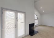 Thumbnail 33 of 43 - a living room with white walls and a door with blinds on it