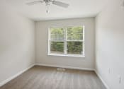 Thumbnail 32 of 39 - bedroom with carpet and window