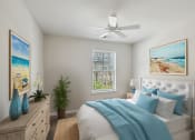 Thumbnail 1 of 19 - a bedroom with a bed and a ceiling fan