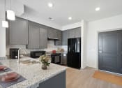 Thumbnail 2 of 14 - kitchen at Waxpool Apartments