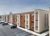 Thumbnail 15 of 30 - an exterior view of a building with a parking lot