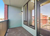 Thumbnail 26 of 26 - a balcony with a door that leads to a balcony