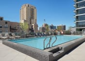 Thumbnail 7 of 22 - a swimming pool on top of a building