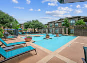 Thumbnail 19 of 48 - our apartments have a large swimming pool with lounge chairs