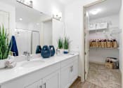 Thumbnail 14 of 35 - a bathroom with a sink and a mirror