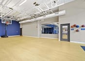Thumbnail 21 of 22 - the multipurpose room has a dance floor and a blue wall and white ceiling