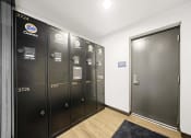 Thumbnail 22 of 22 - a set of stainless steel lockers in a room with