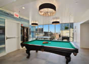 Thumbnail 15 of 22 - the pool room has a view of the city