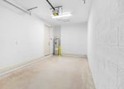 Thumbnail 15 of 35 - a empty room with a white wall and a white door