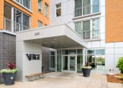 Thumbnail 1 of 45 - the front entrance of a building with the verge building name on it at Verge Apartments in St. Louis Park, MN