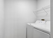 Thumbnail 31 of 61 - A white bed with a pillow and a white wall.