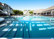 Thumbnail 12 of 35 - View of Pool and Clubhouse Exterior. The Cascades at Tinton Falls, Tinton Falls NJ 07753