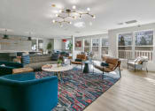 Thumbnail 2 of 39 - a living room with couches and chairs and a large rug