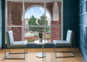 Thumbnail 4 of 39 - two chairs and a table in front of a window
