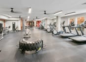 Thumbnail 16 of 39 - the gym with treadmills and other exercise equipment at the belgard apartments