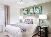 Thumbnail 19 of 25 - Ardenne Apartments bedroom with queen sized bed with white headboard and linen and one large window