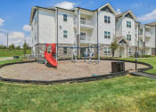 Thumbnail 24 of 36 - the playground at the preserve at polk apartments ga