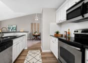 Thumbnail 1 of 37 - Kitchen with white cabinets