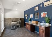 Thumbnail 42 of 47 - A kitchen with a blue wall and a stainless steel sink.