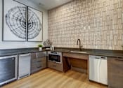 Thumbnail 3 of 40 - a kitchen with a sink and a dishwasher