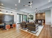 Thumbnail 1 of 40 - a living room with couches and a tv
