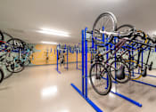 Thumbnail 24 of 43 - A bike rack with many bikes on it.
