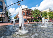 Thumbnail 41 of 43 - A fountain with water jets shooting up into the air.