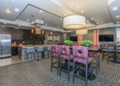 Thumbnail 15 of 33 - a large kitchen and dining room with a table and chairs