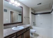 Thumbnail 38 of 48 - the preserve at ballantyne commons apartment bathroom with sink toilet and tub