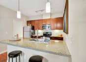 Thumbnail 5 of 48 - a kitchen with a counter top and a sink